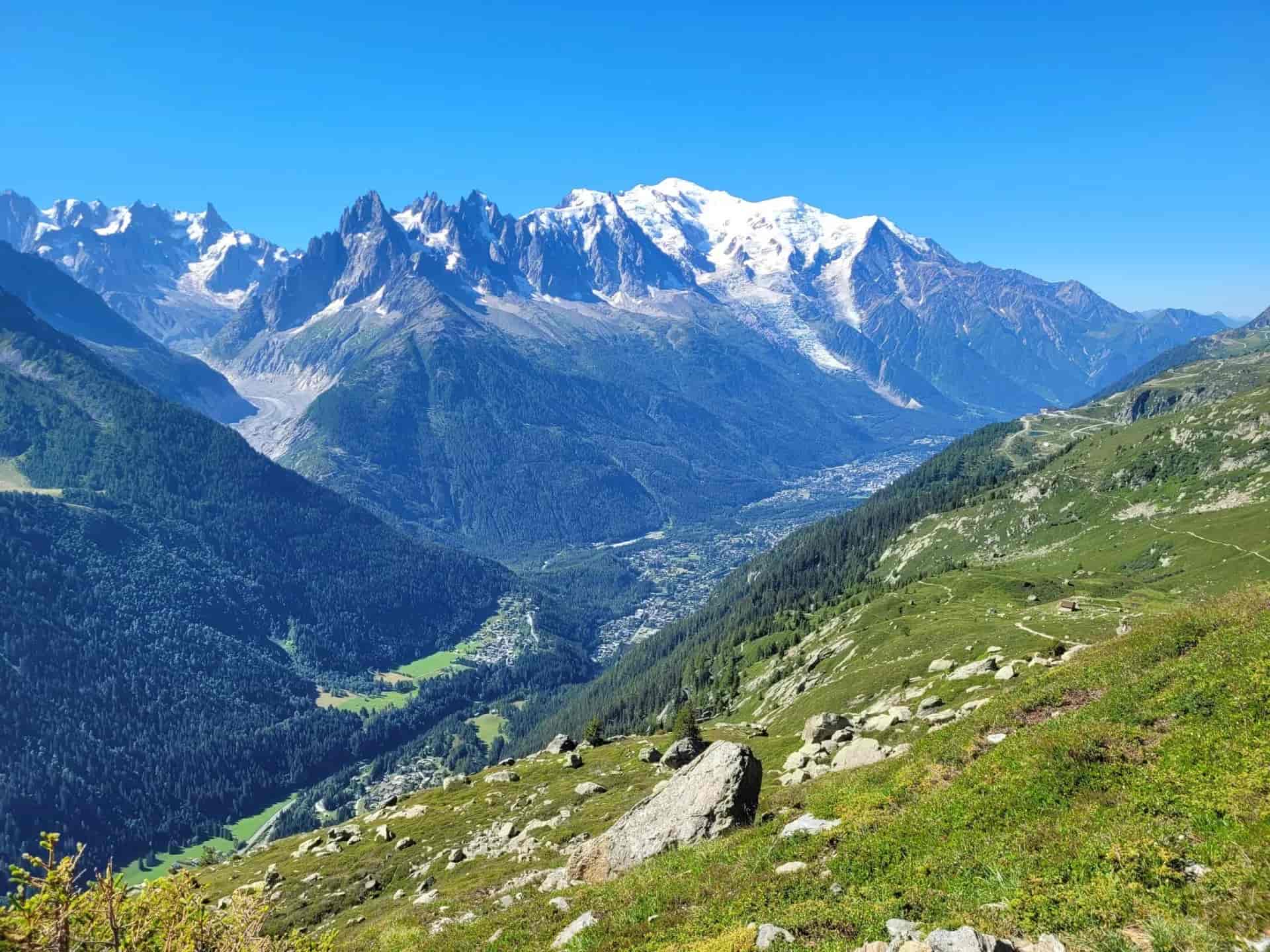 View of Chamonix valley and snow-capped Alps from Lac Blanc hiking trail