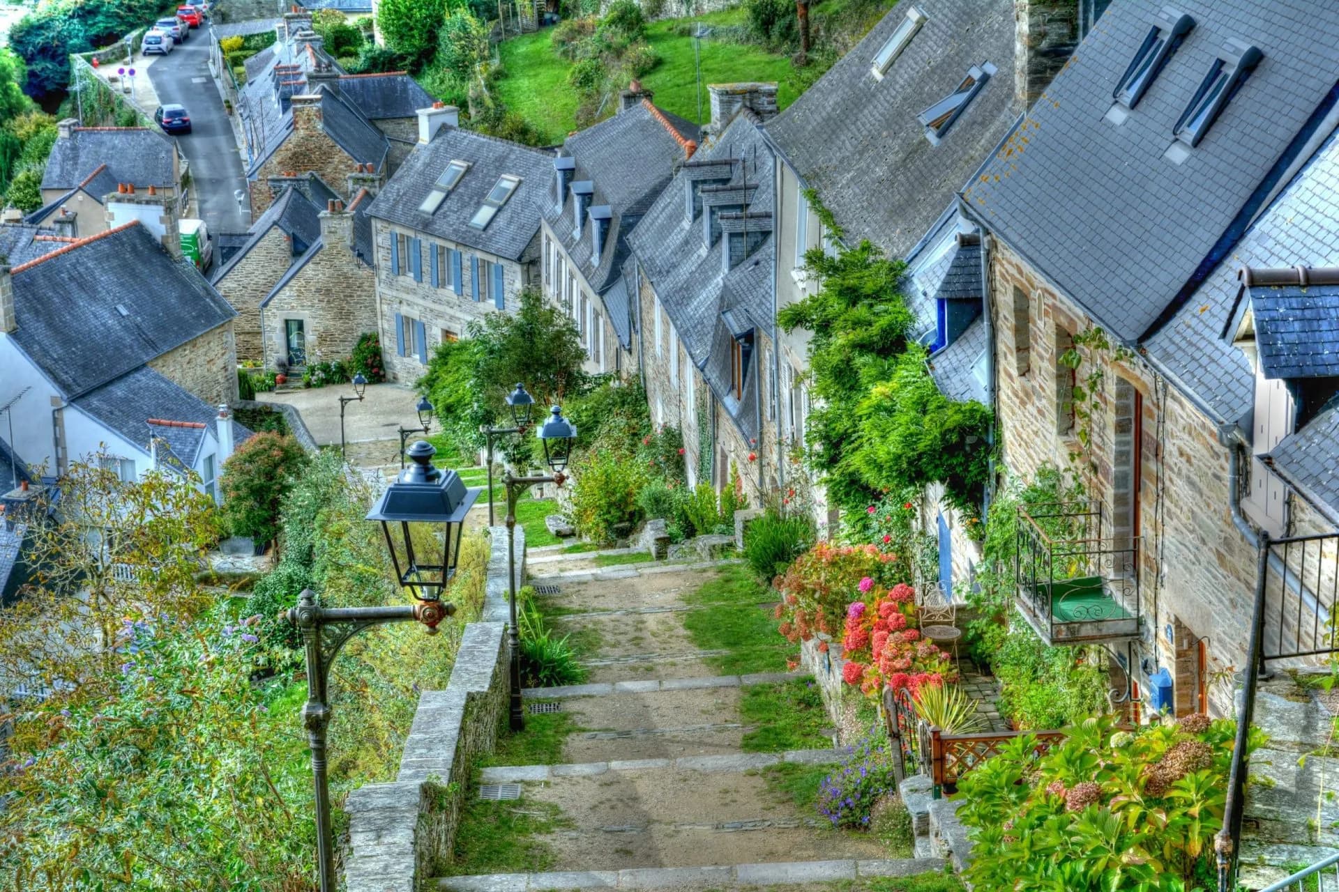 Stone staircase pathway between stone houses with slate roofs in Lannion, Brittany.