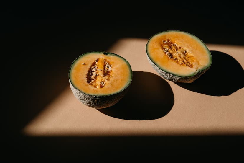 Cavaillon melon halves cut open on neutral surface