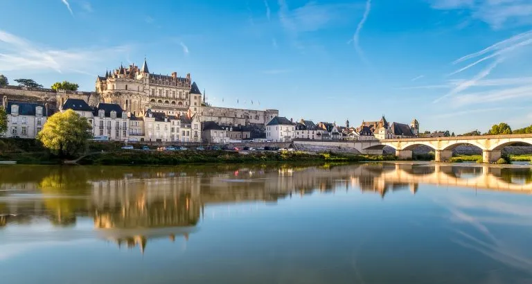 Amboise Castle at sunrise over Loire river